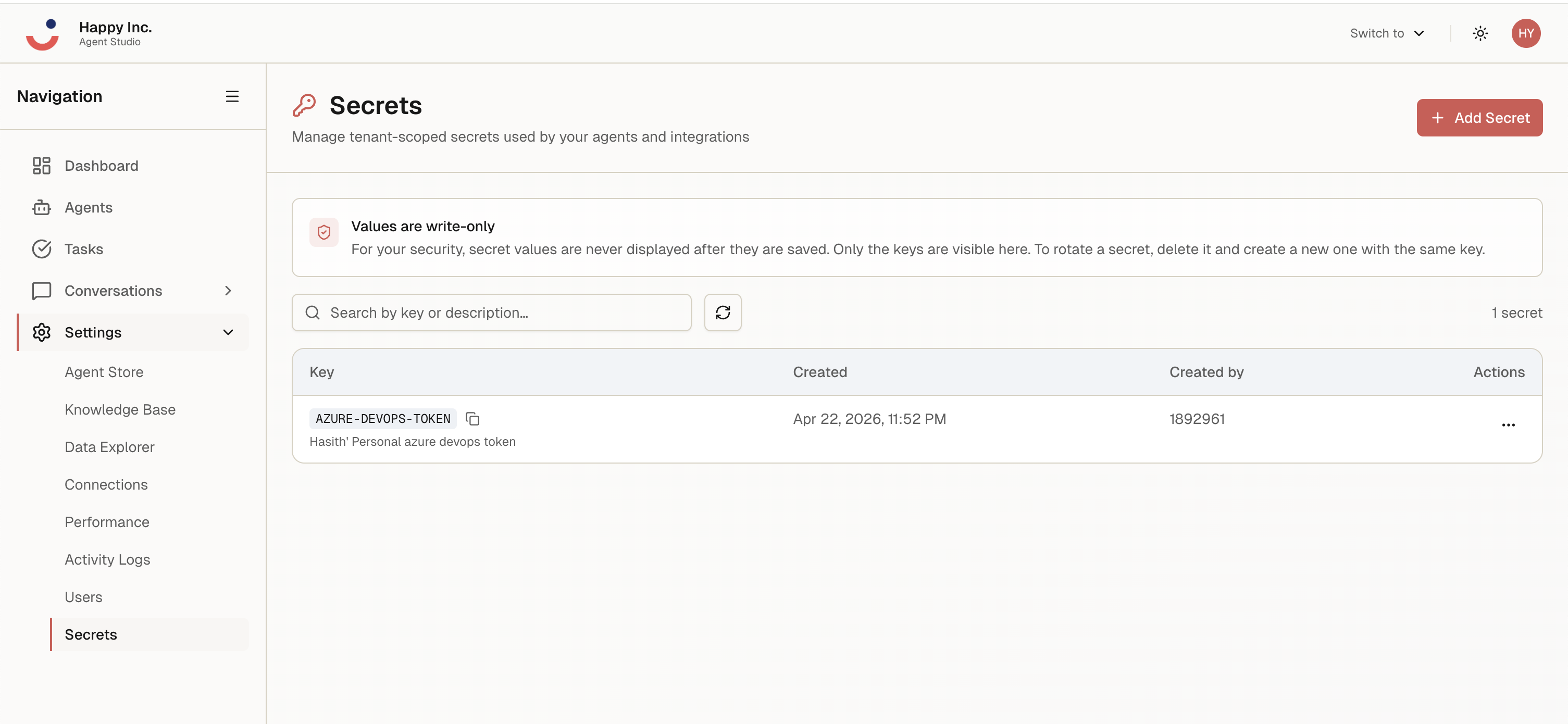 Secrets view: tenant-scoped secrets listed by key, creation date, and creator, with a write-only notice.